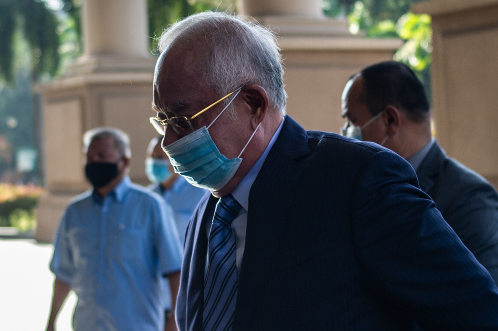 Datuk Seri Najib Razak arrives at the Kuala Lumpur High Court February 15, 2021. u00e2u20acu201d Picture by Shafwan Zaidon